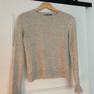 Cashmere sweater with ruffle cuffs